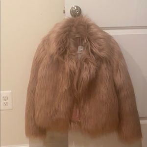 Faux fur jacket- never worn. Tags attached